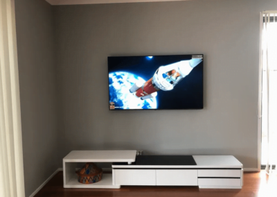 T&R Digital Antenna Installations - Gallery High Definition TV on the Wall Above Cabinet